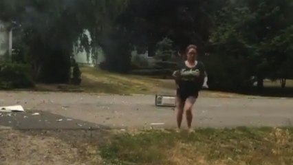 Woman almost taken out by FLYING MICROWAVE DOOR after fireworks go wrong