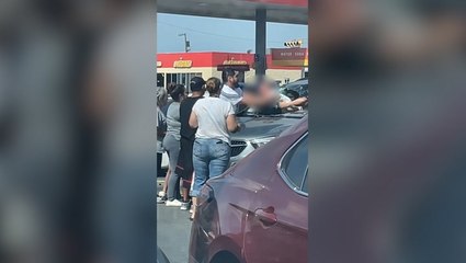 Moment baby locked in hot car rescued by parents smashing windscreen