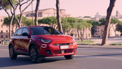 The new Fiat 600e RED Driving in the city