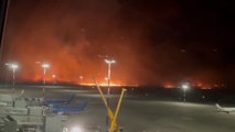 Wildfire shuts Italian airport as flames spread close to planes