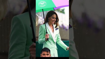 A very cheerful Kate Middleton didn't let the rain dampen her spirits as she visited Wimbledon