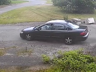 Car Drives Over Lawn To Hit Cement Mailbox