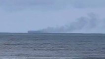 One dead, several injured as fire tears through cargo ship carrying thousands of cars in North Sea