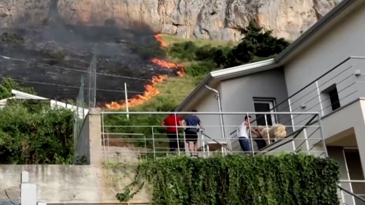 People watch as Palermo wildfire approaches homes