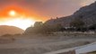 Tourists and locals evacuated to safety as wildfires blaze across Greek island of Rhodes