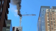 Terrifying video shows crane crashing into Manhattan skyscraper after catching fire