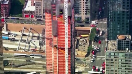 NYC crane snaps, crashes into street