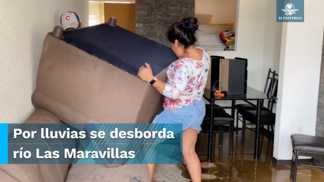 Quedan entre lodo y basura casas inundadas por desbordamiento de canal en Chalco