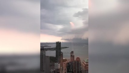 Stunning view of storm clouds at top of World Trade Center building