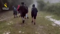 Moment police rescue children from raging storm at camp site in northern Spain