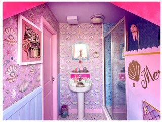 Couple transform their 'boring' new build house into a pink paradise