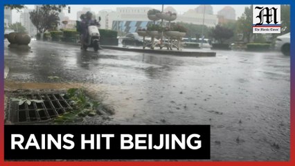 Beijing hit by torrential rain