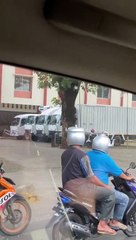 Makassar Motorists Have Helmet Pots