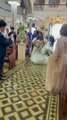 Watch: Bride walks down flooded aisle