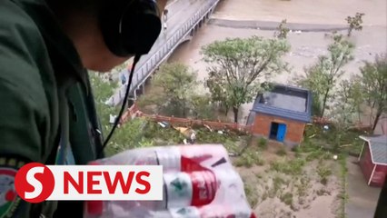 Download Video: China directs all-out efforts to flood rescue and relief in Beijing