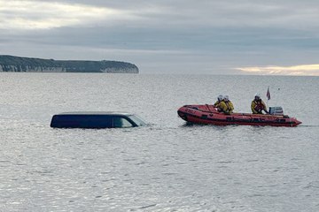 Van driver has disaster as vehicle gets stuck in the sea
