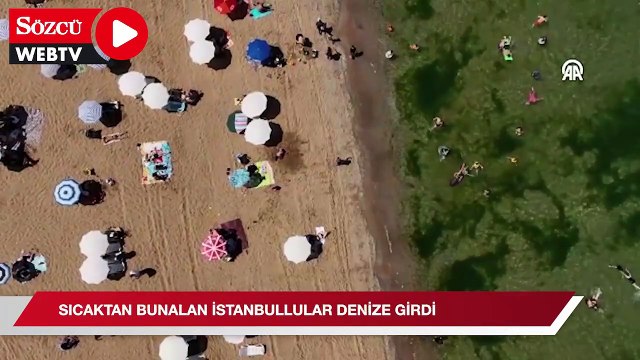 Sıcak havadan bunalan İstanbullular serinlemek için denize girdi