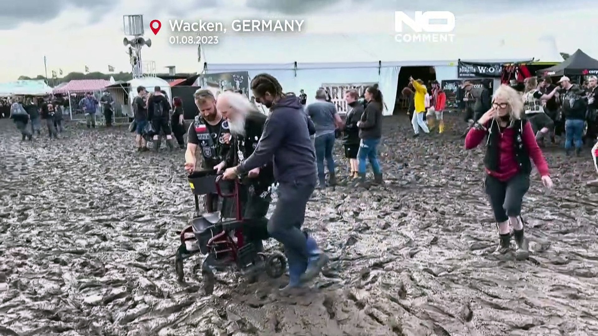 ⁣WATCH: Muddy affair as driving rain mires world's top heavy music festival