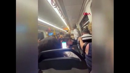 Metroda eşini başka bir kadınla bastı!
