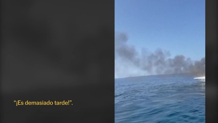 El rescate de dos navegantes que saltan de un barco en llamas en Michigan
