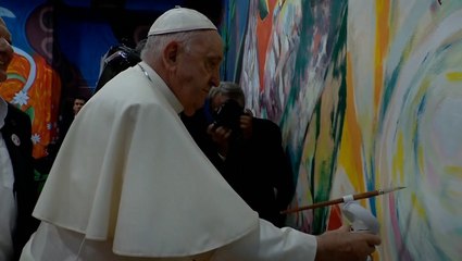 How art can it be: Pope Francis paints on school mural in Lisbon