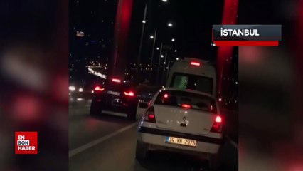 15 Temmuz Şehitler Köprüsü'nün ortasında camdan sarkıp tartıştığı şoföre vurmaya çalıştı