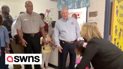 Sheriff escorts little girl into her first day of preschool after father killed in the line of duty