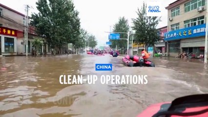 Authorities warn of more rain in China as mop-up operations continue
