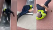 Boston police officer flies off children’s slide in viral video