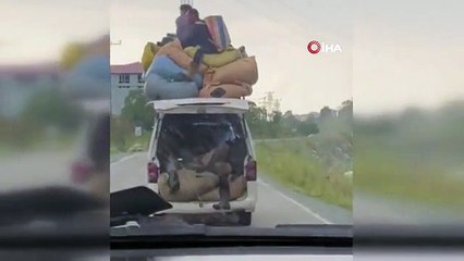 Çay yüklü aracın üzerinde tehlikeli yolculuk kamerada