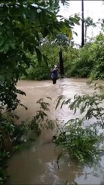 Villagers risking their lives with the help of rope