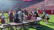 Nick Saban Signs Autographs at Alabama Football Fan Day