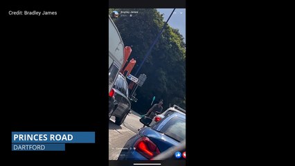 Juggler entertains motorists in Dartford
