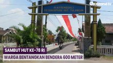 Warga Bentangkan Bendera Sepanjang 600 Meter di Atas Jalan Desa di Sidoarjo