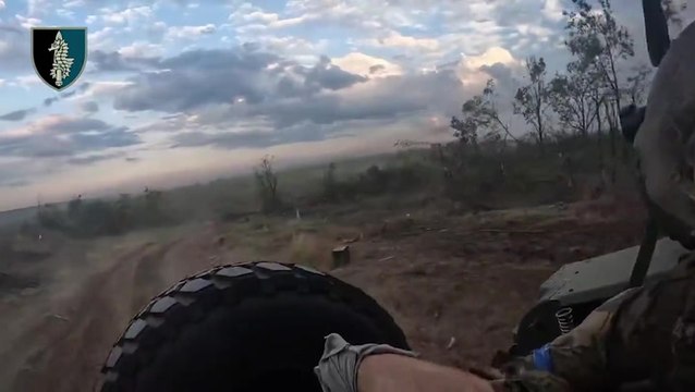 Moment Russian drone nearly hits Ukrainian evacuation car