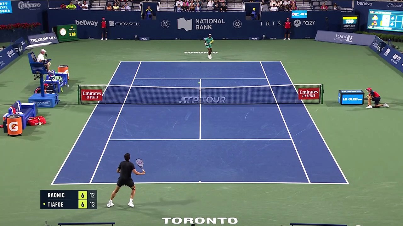 Tiafoe wins first set against Raonic after rare net touch winner