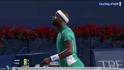 Tiafoe wins first set against Raonic after rare net touch winner