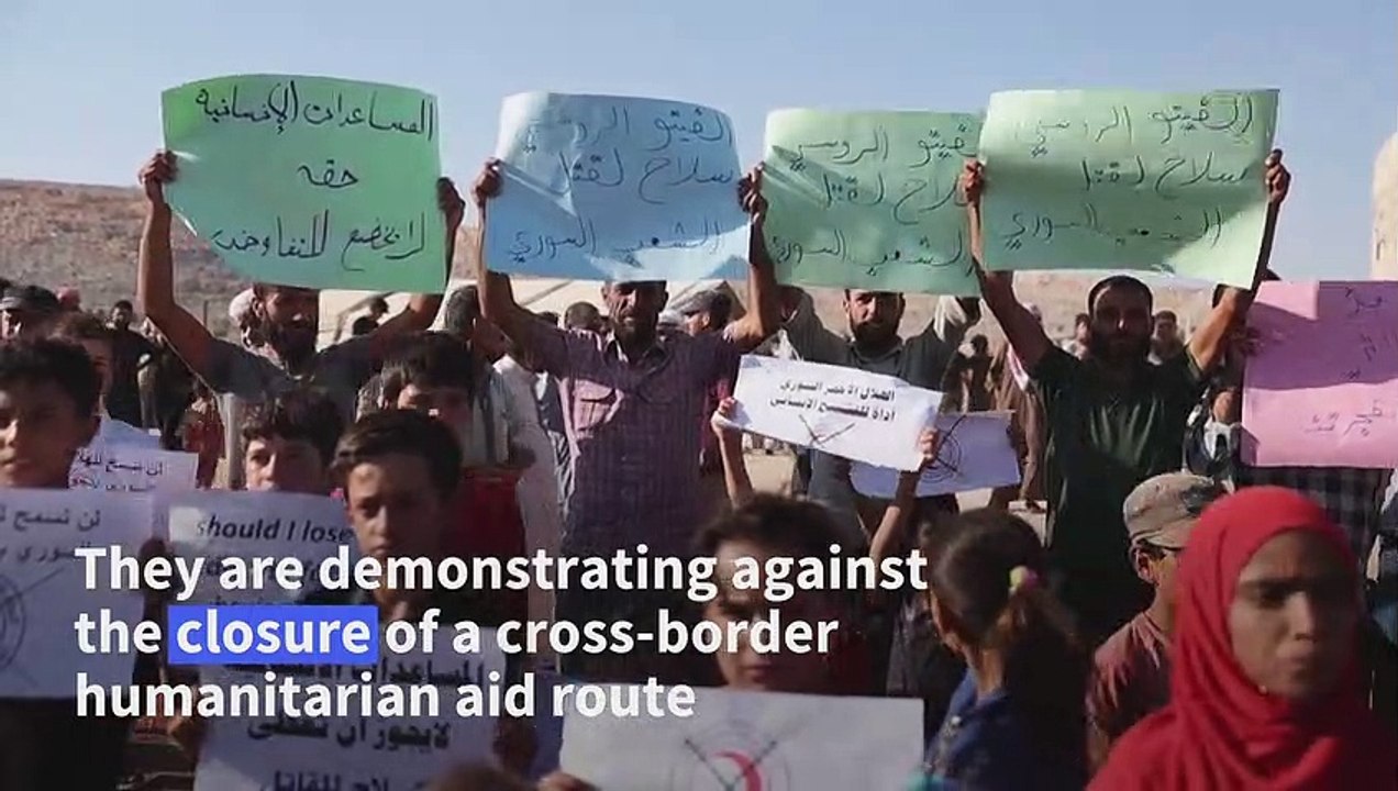 Displaced Syrians protest near Syria-Turkey bor...