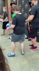 A fan tries to steal Rhea Ripley from Dirty Dom