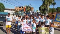 Alunos do projeto Esporte por Toda Parte promovem ação de conscientização do Agosto Lilás em Amélia Rodrigues