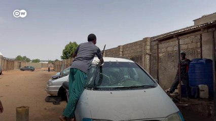 Nigerian student washes cars to fund education