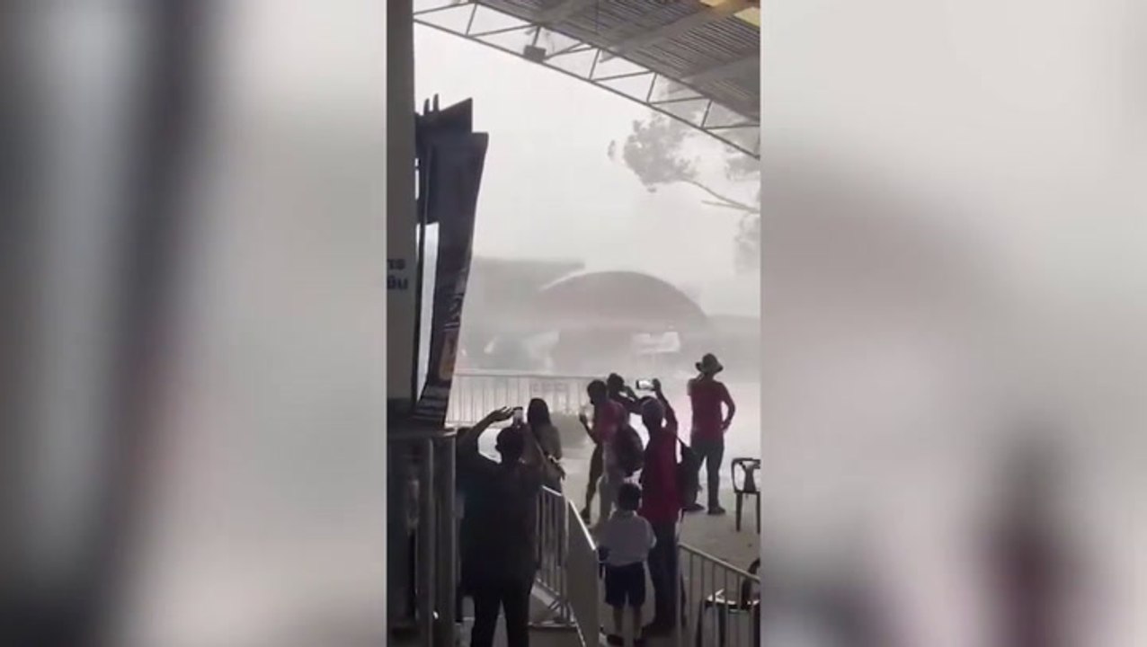 Pupils flee as powerful storm batters classrooms at Thailand school