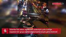 Asker eğlencesi için toplanan grup yolu trafiğe kapattı