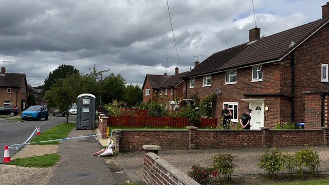 Police outside an address on Hammond Road, Woking, August 11, 2023