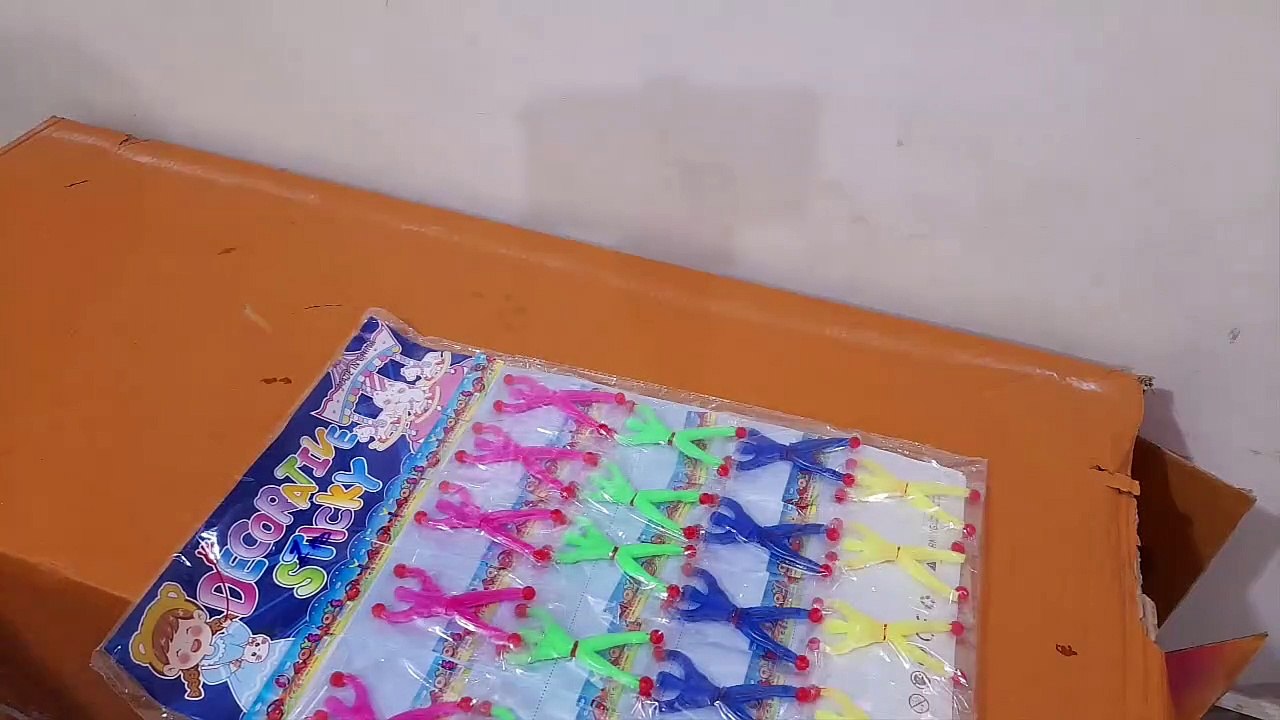 Unboxing and Review of Stretchy Sticky Toy Novelty Fidget Toy Including Large Sticky Wall Climber Men