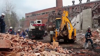 Search teams comb rubble after factory explosion close to Moscow