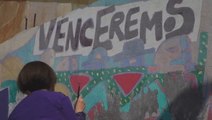 Former prisoners restore mural to those who disappeared during Chile’s dictatorship