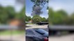 Plane crashes into parking lot during Michigan air show shortly after the pilot and backseater parachute out