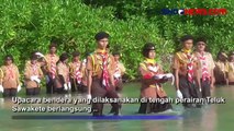 Unik, Perayaan Hut Pramuka di Tengah Aliran Teluk Sawakete, Nias Utara