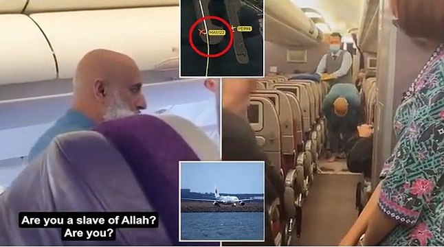 Moment crazed passenger kneels down to pray in middle of Malaysia Airlines plane's aisle after forcing jet to turn back to Sydney and launching into 'slaves of Allah' rant